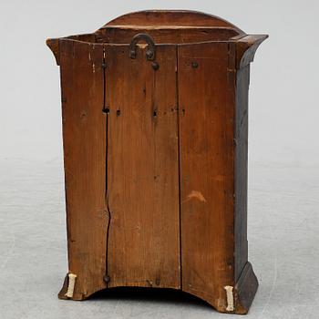 A Swedish early 19th century hanging cabinet.