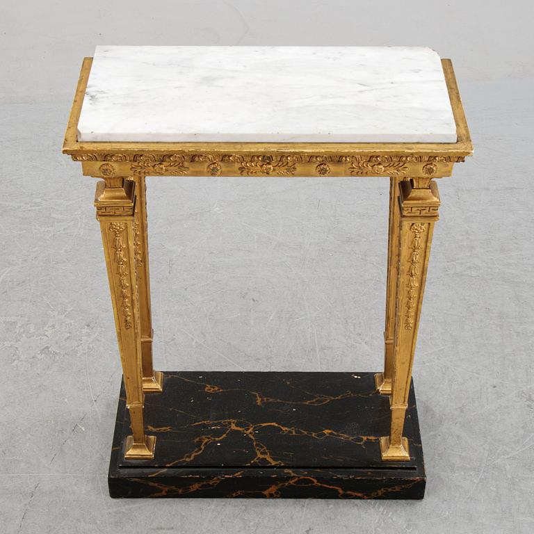 An early 19th Century console table.