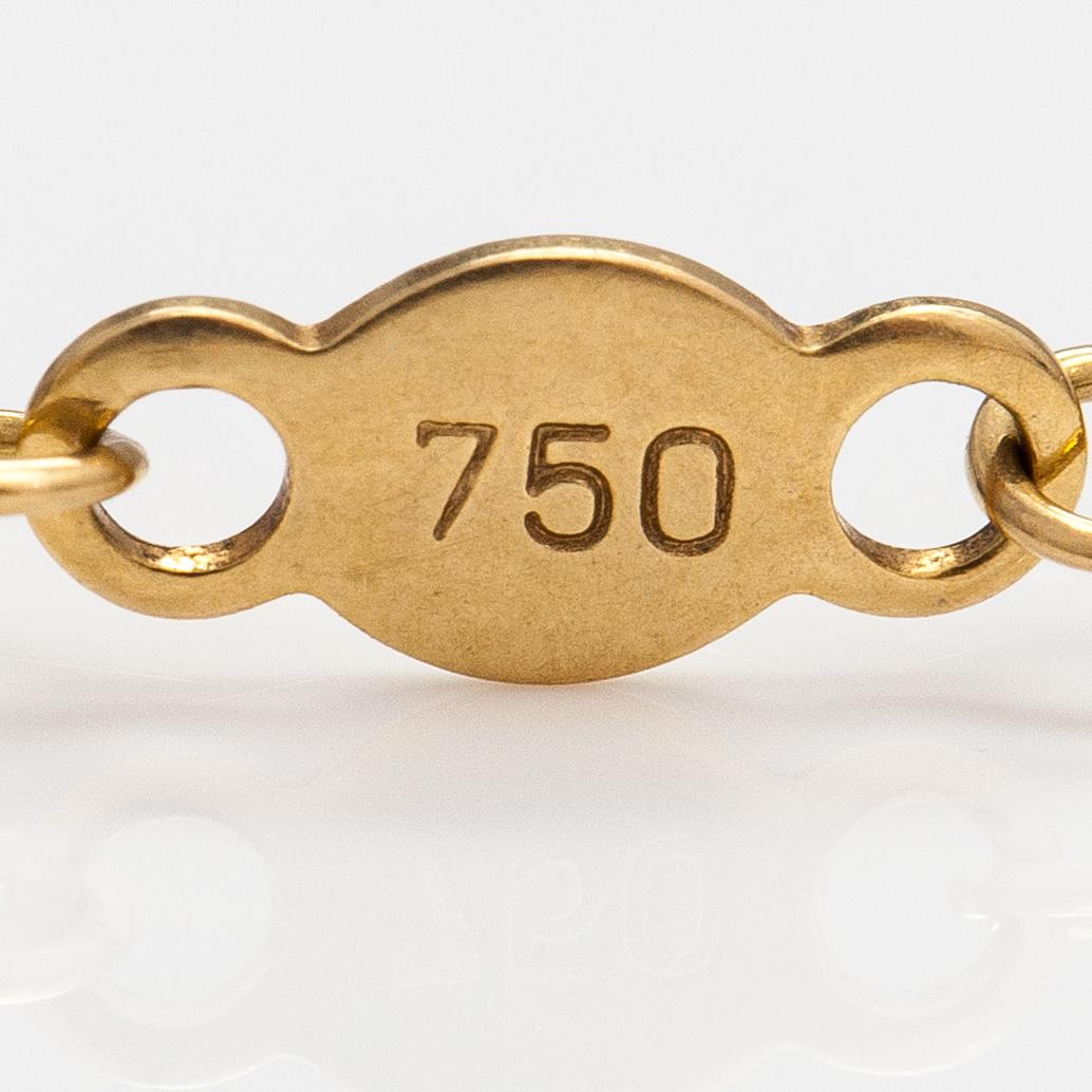 Georg Jensen, An 18K gold bracelet "Magic" with a cultured pearl and diamonds ca. 0.048 ct in total, Denmark.