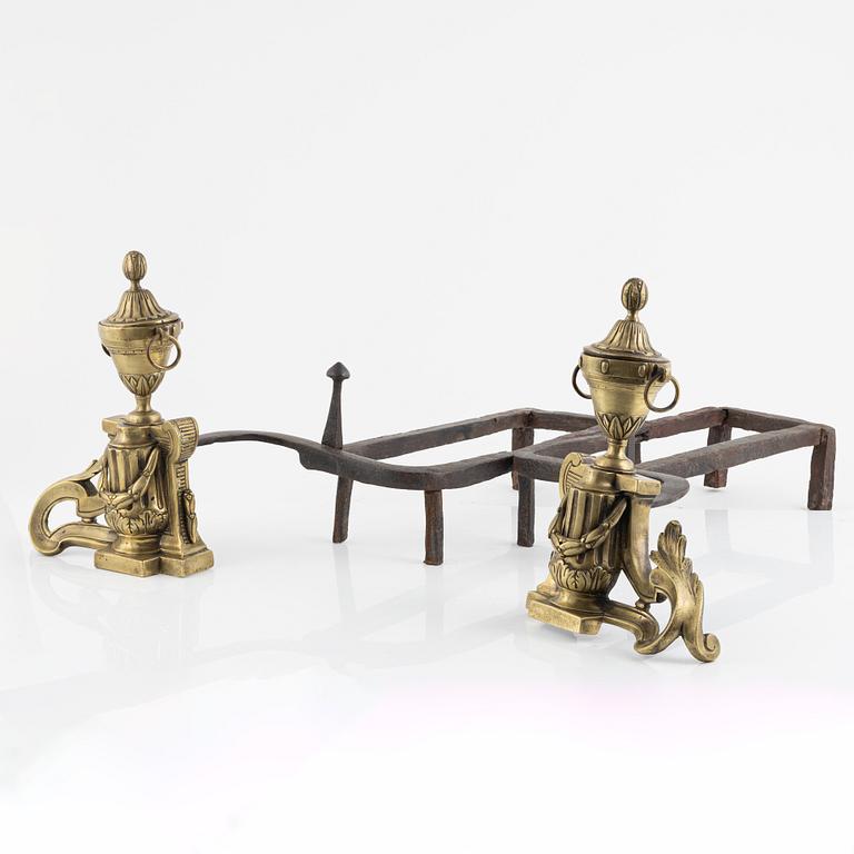 A pair of bronze andirons, Louis XVI-style, around 1800.