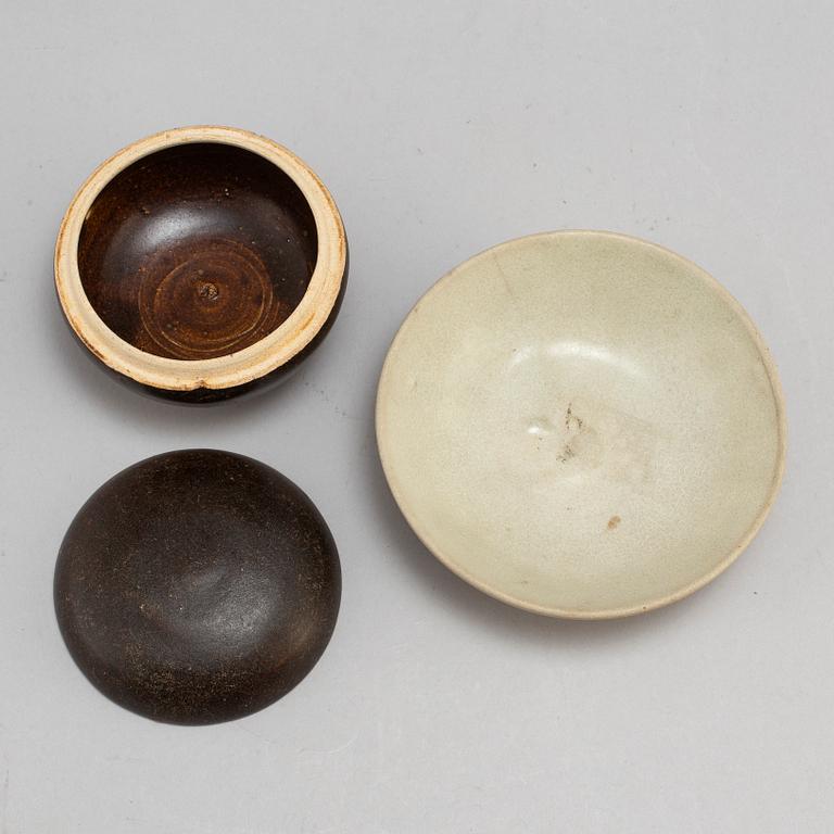 A ceramic bowl, Yuan dynasty, and a jar with cover, South East Asian, 14th century.