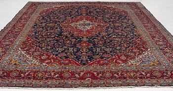 A Kashan carpet, a. 420 x 290 cm.