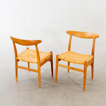 Four model 'W2' oak chairs by Hans Wegner for C.M. Madsen, Denmark, designed 1953.