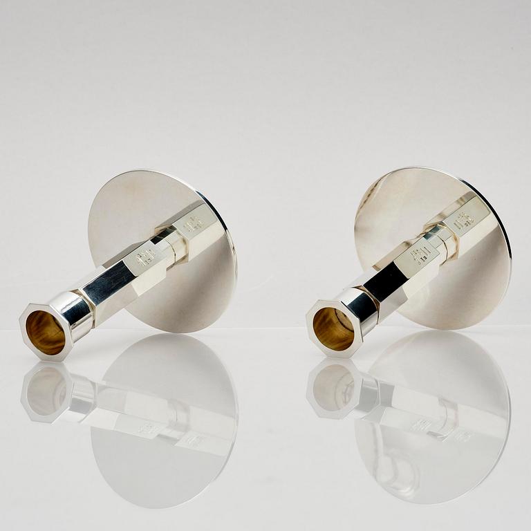 Wiwen Nilsson, a pair of sterling silver candlesticks, Lund, Sweden 11957 and 1960.