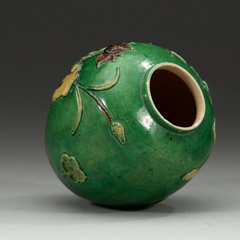 A green, aubergine and yellow glazed bisquit jar, Qing dynasty, 19th Century.