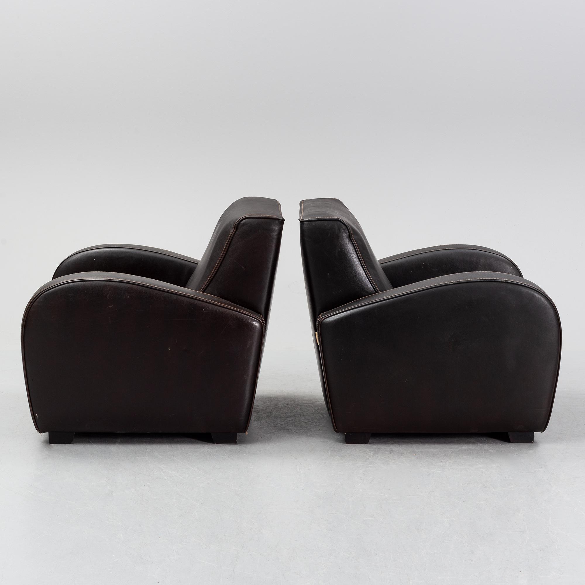 A pair of Italian leather armchairs from  Industria Divani e Poltrone, 21st-century.