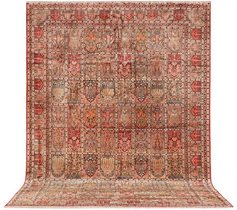 A carpet, silk Kashmir, ca 428 x 299 cm.