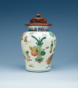 1367. A Transitional wucai jar, 17th Century.