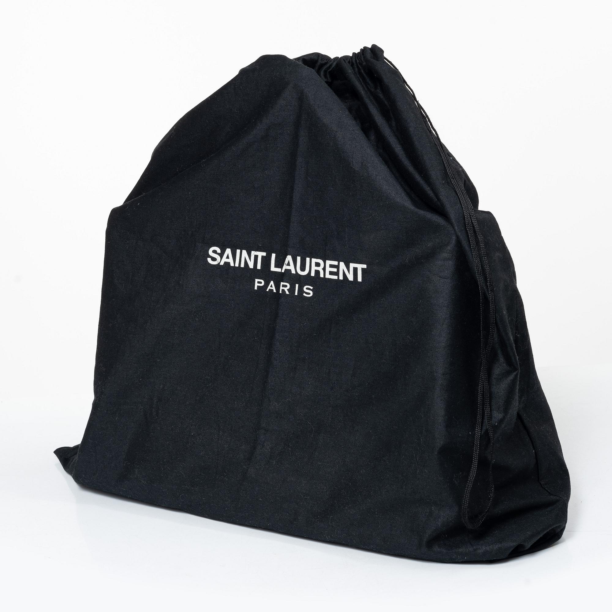 Yves Saint Laurent, a 'Sac du Jour' handbag.