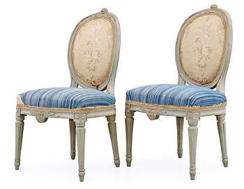 A pair of Gustavian 18th Century chairs.