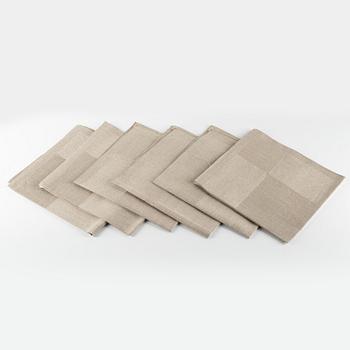 The Nobel tablecloth, a set of six napkins by Ingrid Dessau for Klässbol, Sweden.