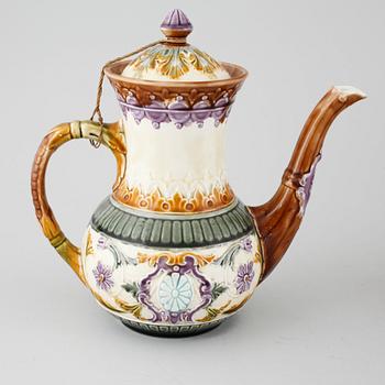 A majolica collection of one coffee pot and three tea pots from Rörstrand, around turn of the century 1900.