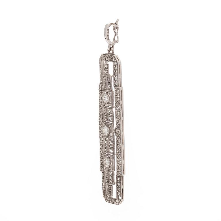 An 18K white gold pendant set with brilliant-cut and rose-cut diamonds.