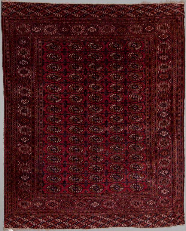 A Turkmen carpet, old. Circa 256x212 cm.