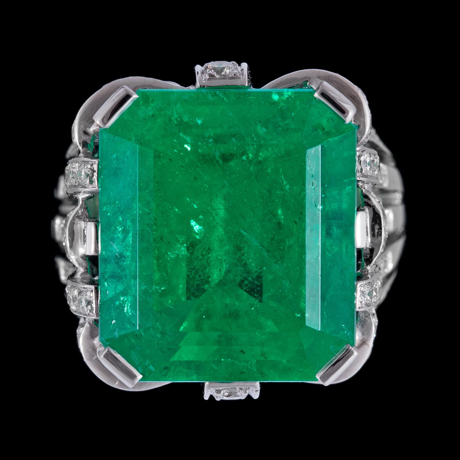 A step cut emerald, 13.73 ct and brilliant cut diamonds, tot. 1.57 cts.