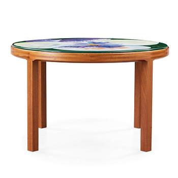 100. P. TÖRNEMAN & HI-GRUPPEN, an enamel and mahogany dinner table, Sweden 1971.