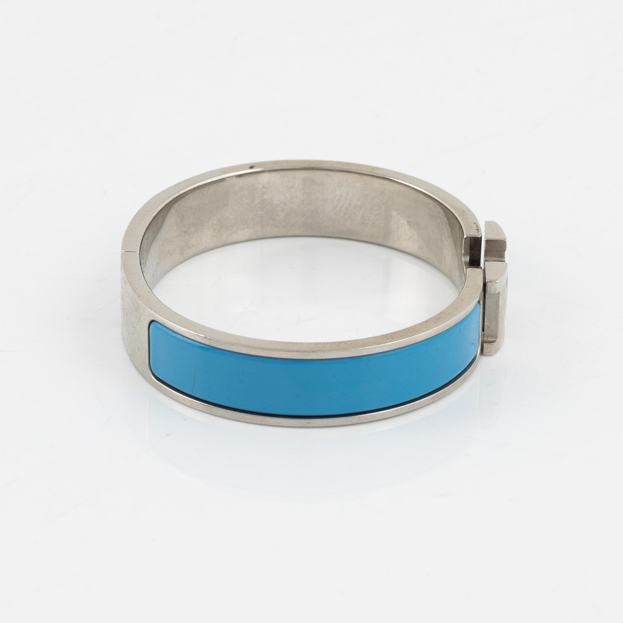 Hermès, a 'Clic H' bracelet.
