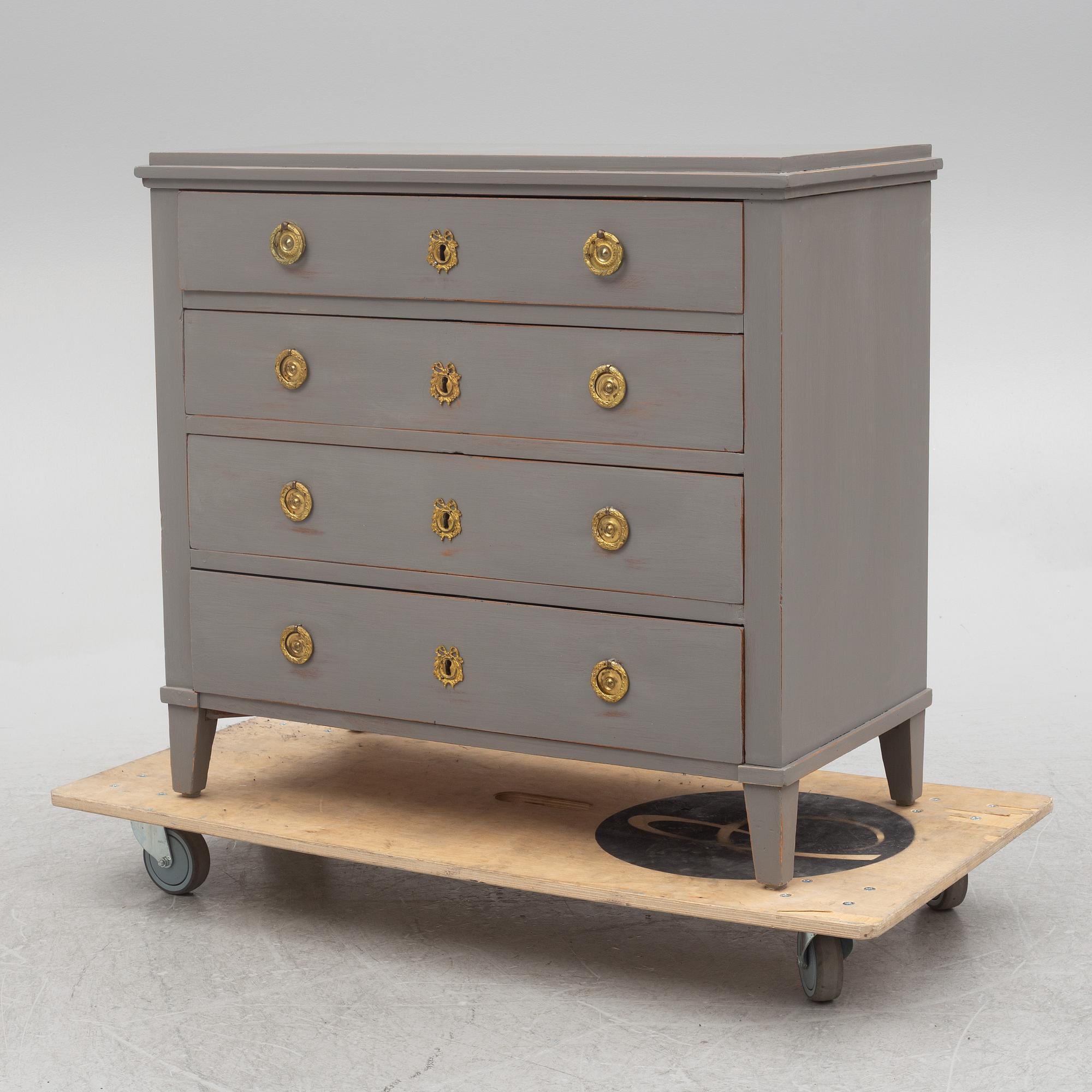 A Gustavian style chest of drawers, early 20th century.