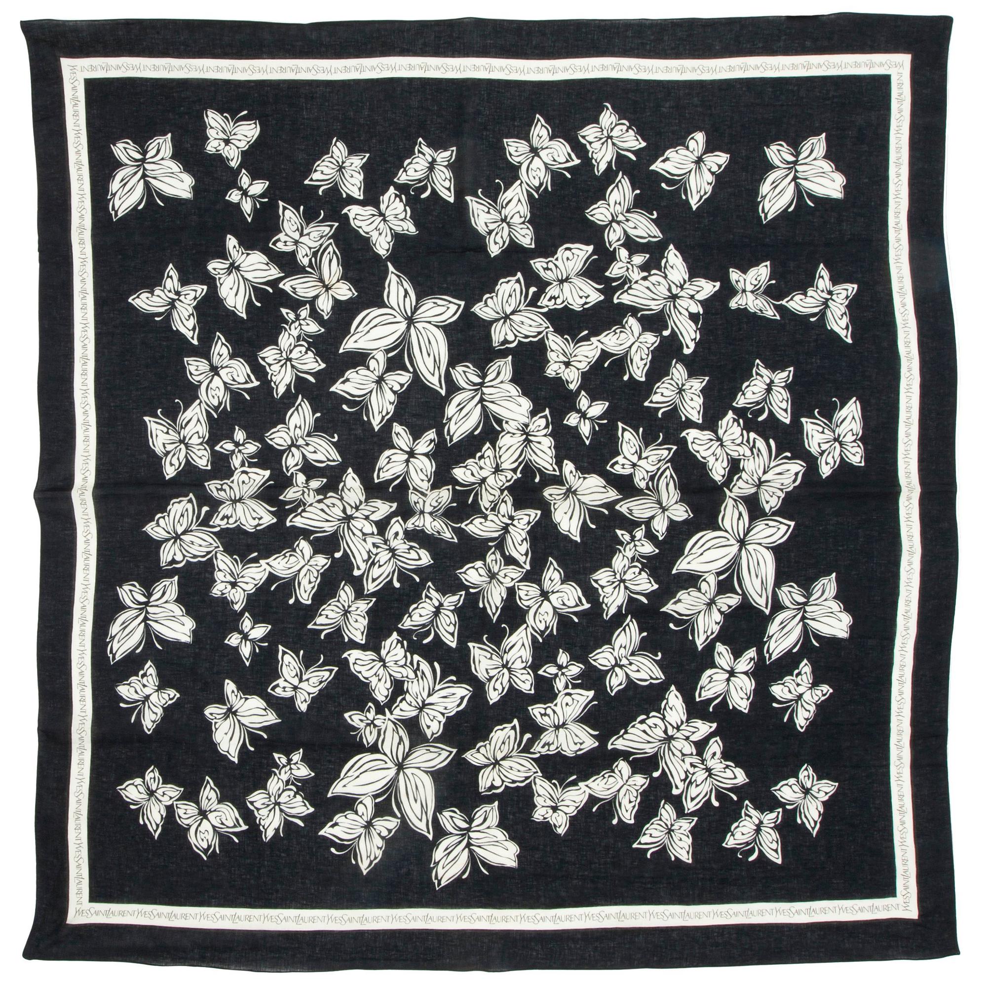 YVES SAINT LAURENT, a blue cotton blend shawl.