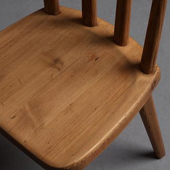 Axel Einar Hjorth, a set of six "Utö" stained pine chairs, Nordiska Kompaniet, Sweden 1930's.