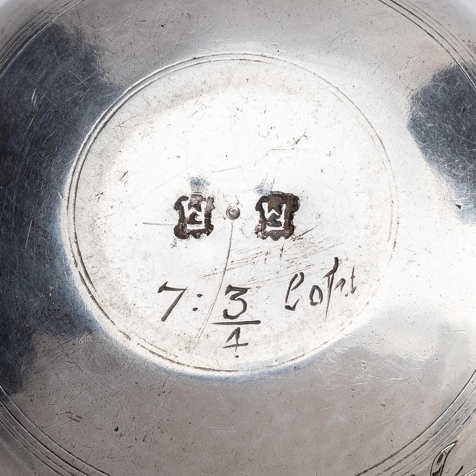 An Estonian parcel-gilt silver tumbler, mark of Jacob Fleischmann, (active in Arensburg 1675-1698).