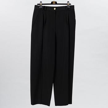 SKIRT AND A PAIR OF TROUSERS.