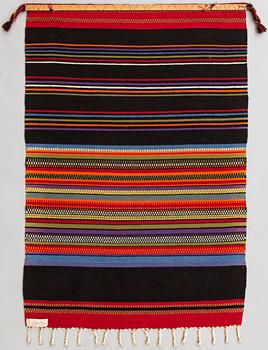 Elsa Montell-Saanio, A Raanu "Maddar Ahku" textile from Lapland designed by Elsa Montell-Saanio. Circa 132x90 cm.