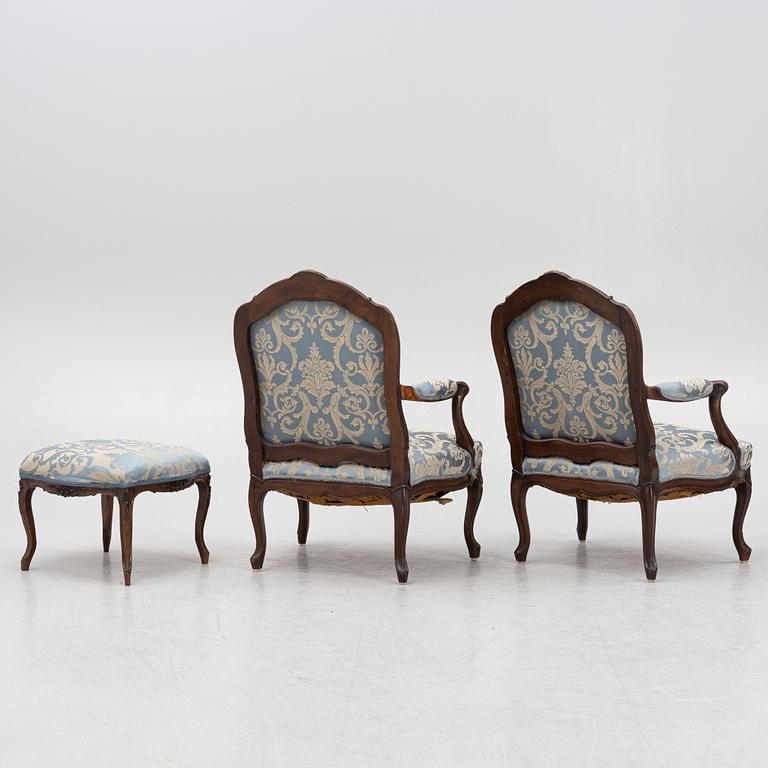 Armchairs, a pair, and a stool, Rococo style and Rococo, circa 1900 and 18th century.