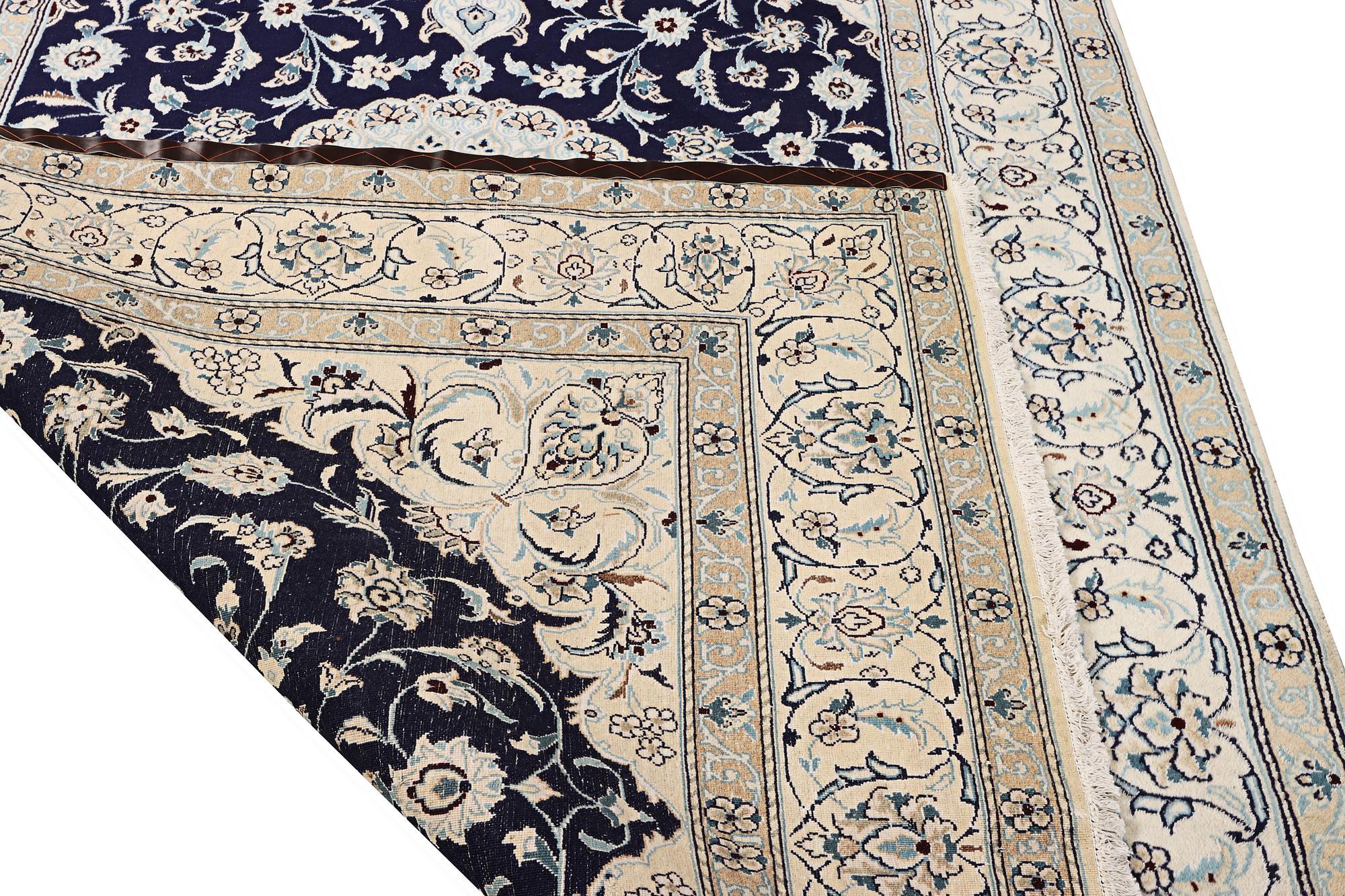 A part silk Nain rug, 9LA, c. 292 x 190 cm.