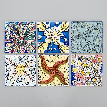 A set of six earthenware tile plates, after Salvador Dalí, late 20th century.