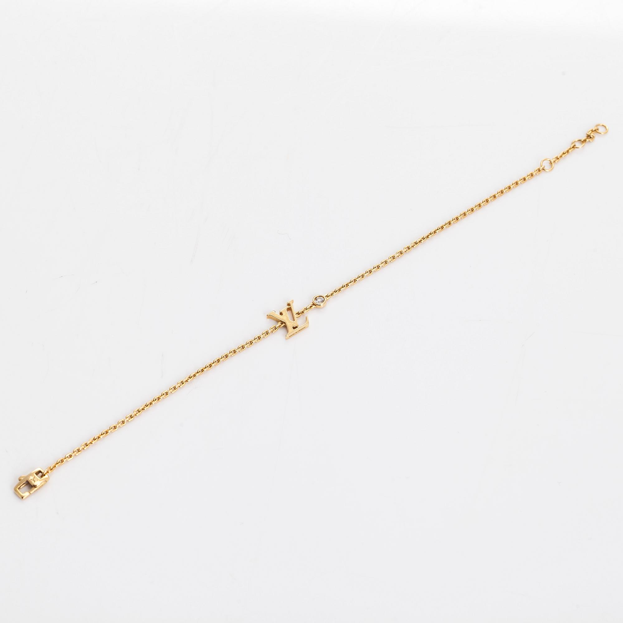 Louis Vuitton, an 18K gold 'Idylle Blossom LV' bracelet with a diamond.