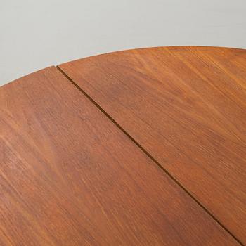 Four chairs and a dining table, probably Karl Andersson & Söner, second half of the 20th century.