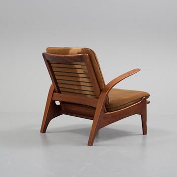 ROLF RASTAD AND ADOLF RELLING, a teak 'Rock n' Rest' easy chair from Arnestads Bruk, Norway, 1950's/60's.