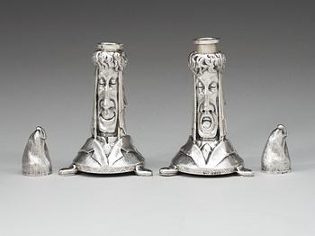 A pair of English Victorian silver candlesticks, makers mark possibly of Henry Willian Dee, London 1878-1879.