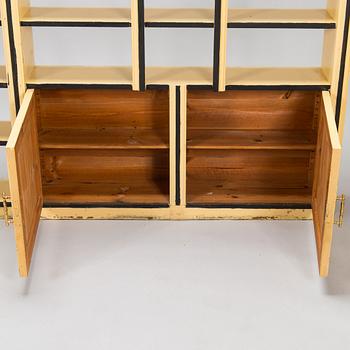 Two wall cabinets and shelves, Sagu pharmacy furniture, Finland early 20th century.
