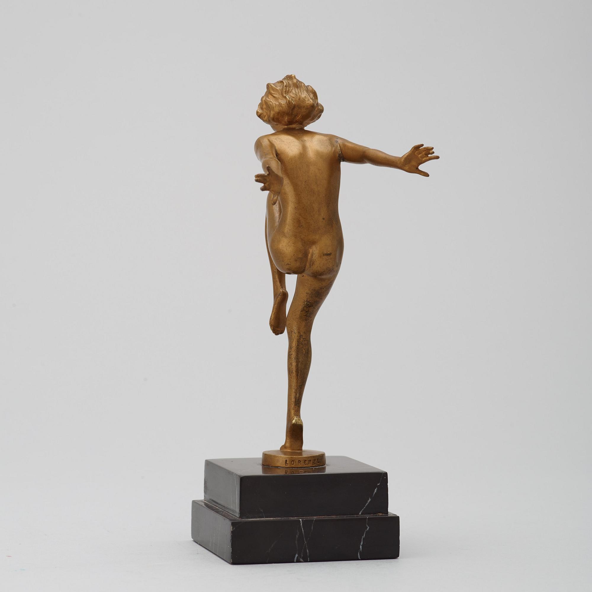 A Josef Lorenzl Art Déco gilt bronze sculpture of a nude dancer, Austria.