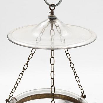 A glass and metal lantern, early 20th century.