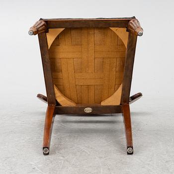A set of 7 chairs, Empire style, W. Taylor & Sons, circa 1900.