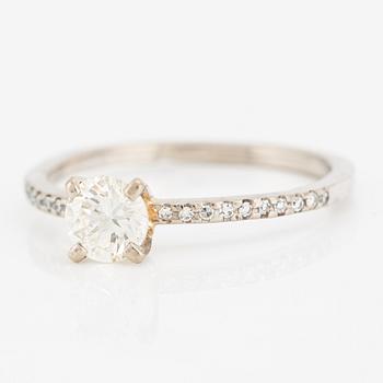 Ring with a brilliant-cut diamond approximately 0.60 ct and small octagon-cut diamonds.