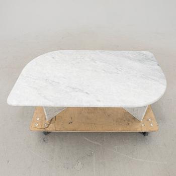 A 21st century marble coffee table.