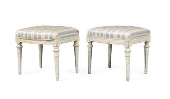 900. A pair of Gustavian stools.