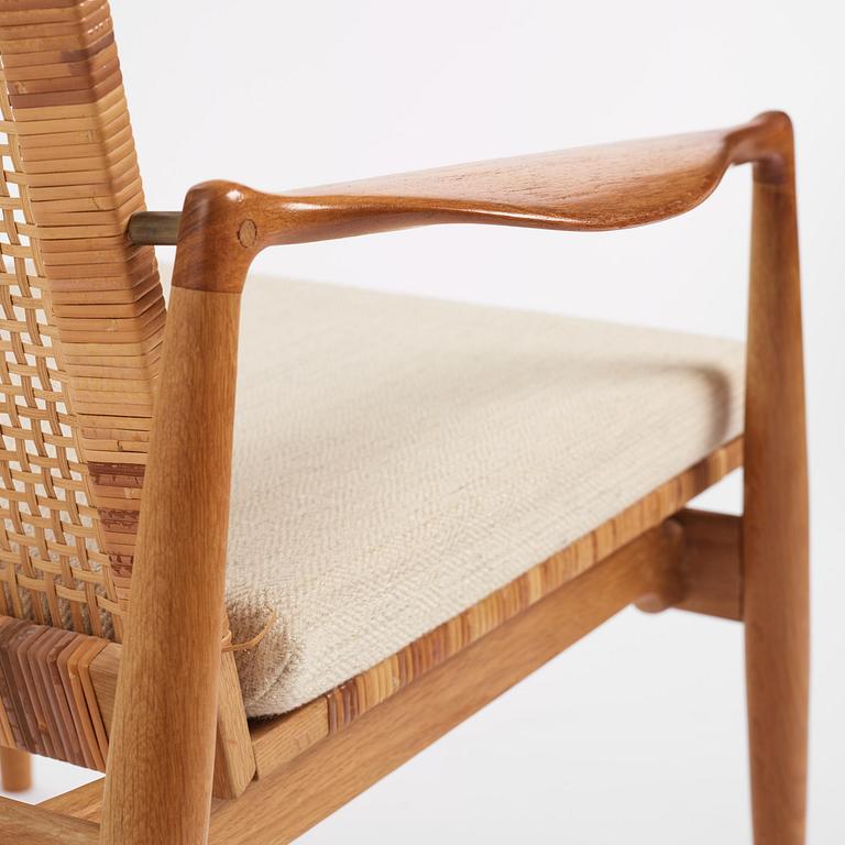 Finn Juhl, a pair of "SW 96" easy chairs, Søren Willadsen, Denmark.