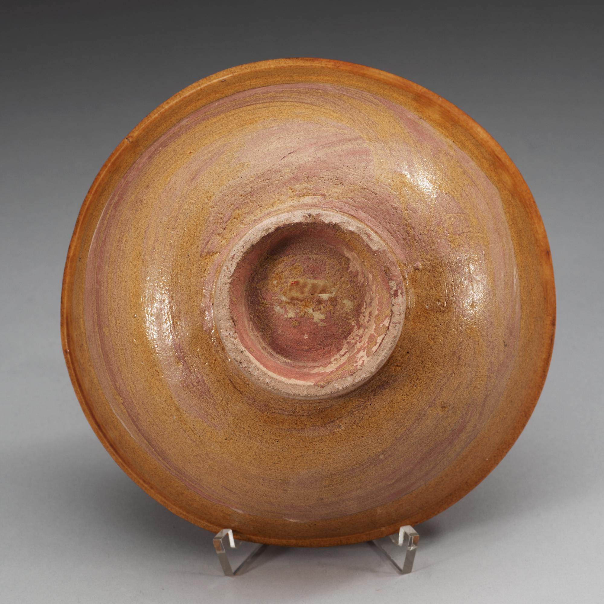 A yellow glazed bowl, Liao dynasty (907-1125).