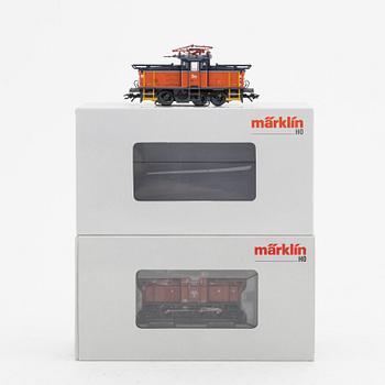 Märklin, two electrical locomotives, model no 36335 and 36337, gauge H0, in boxes.