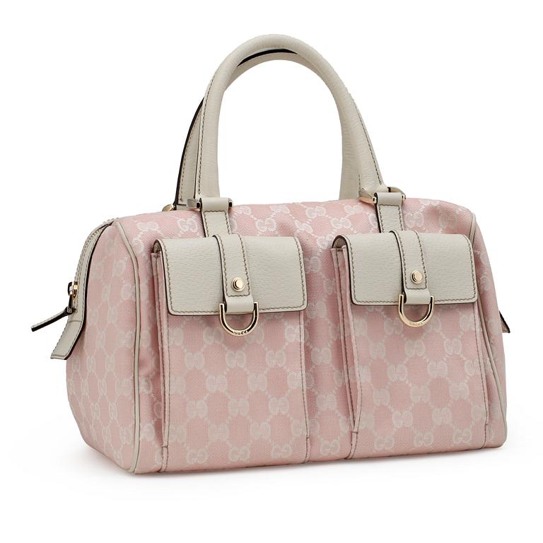 GUCCI, a pink monogram canvas handbag.