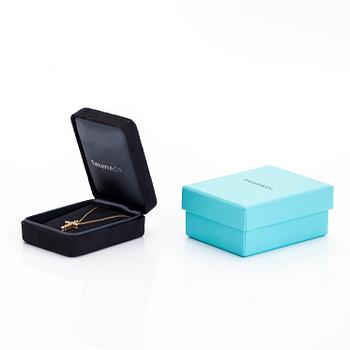 Tiffany & Co, kaulakoru, risti, 18K kultaa ja timantteja, yht. n. 0.42 ct.