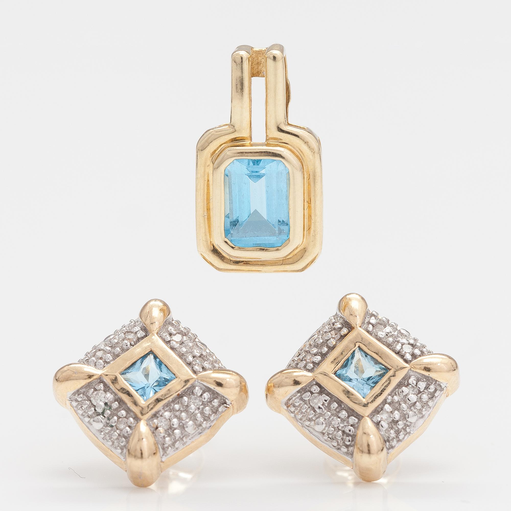 A set of 14K gold earrings and pendant with topazes and diamonds ca. 0.04 ct.