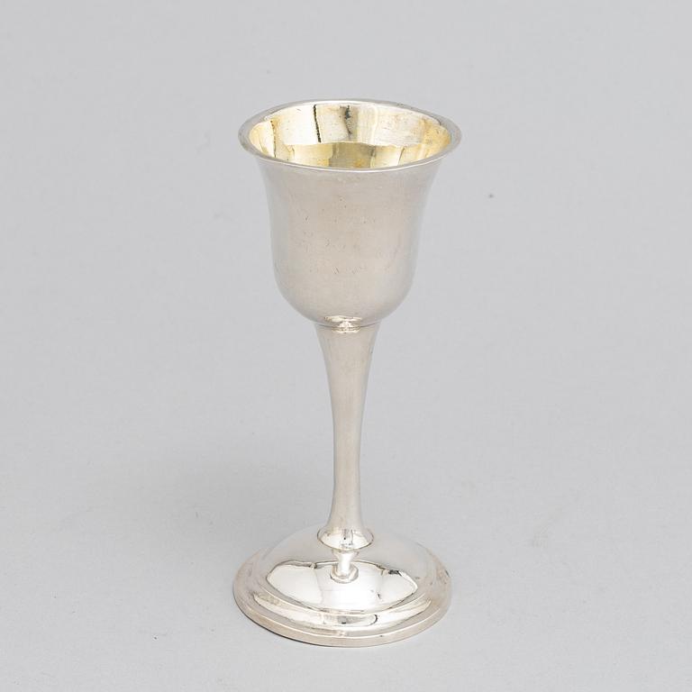 A Swedish 18th / 19th century silver beaker, cup and caster-spoon.