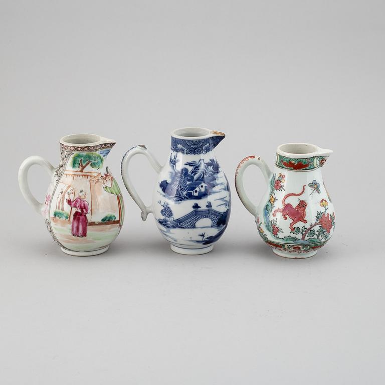 A group of three famille rose and blue and white jugs, Qing dynasty, Qianlong (1736-95).