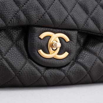 Chanel, a black, quilted leather 'Timeless Flap Bag XXL', 2017-2018.